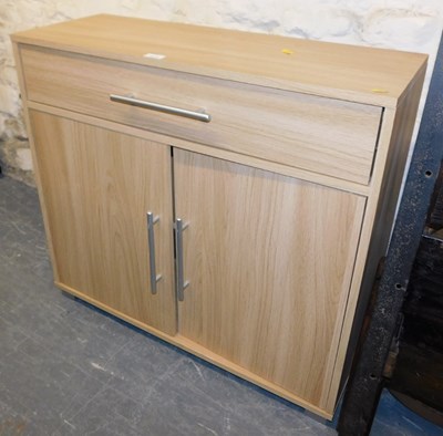 Lot 1173 - A two door side cabinet, 75cm high, 81cm wide,...