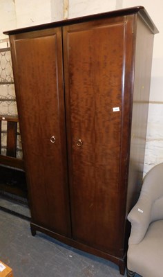 Lot 1095 - A Stag Minstrel double wardrobe.
