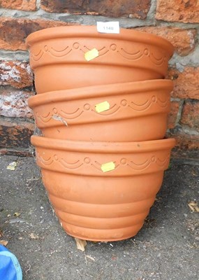 Lot 1148 - Three wall mounted terracotta garden plant...