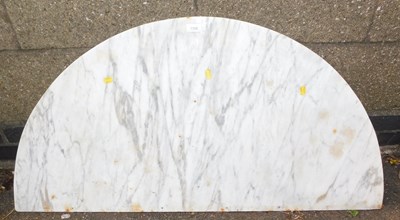 Lot 1152 - A white marble demi-lune table top, with grey...