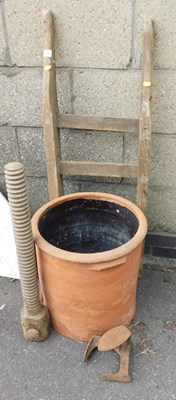 Lot 1153 - A terracotta garden planter, of cylindrical...