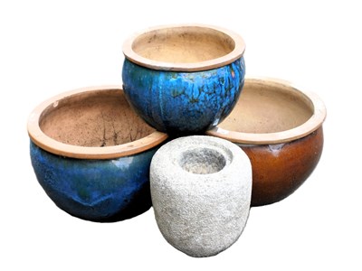 Lot 393 - A pair of graduated blue glazed ceramic garden...
