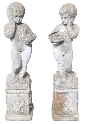 Lot 395 - A pair of concrete garden statues of putti,...