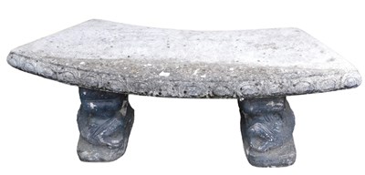 Lot 404 - A reconstituted stone garden seat, with a...