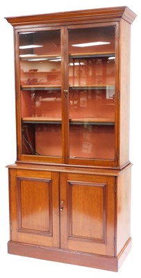Lot 413 - A Victorian mahogany cupboard bookcase, the...