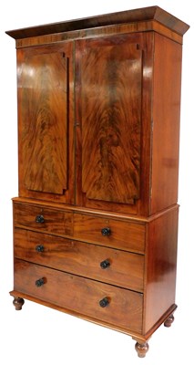 Lot 420 - A Victorian mahogany linen press, the outswept...