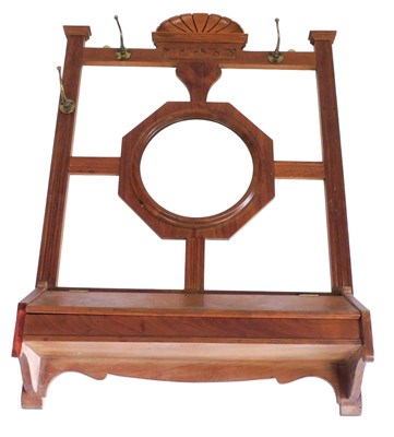 Lot 427 - A Victorian mahogany wall mounted hall stand,...