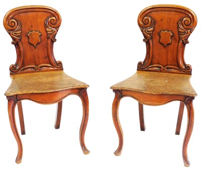Lot 429 - A pair of Victorian mahogany hall chairs, the...