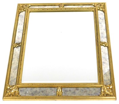 Lot 437 - A Belgian giltwood rectangular wall mirror,...