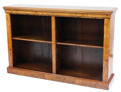 Lot 456 - A Victorian walnut open bookcase, subdivided...