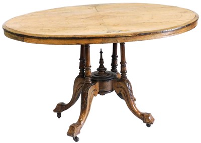 Lot 728 - A Victorian walnut and inlaid oval tilt top...