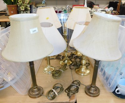 Lot 2161 - A group of brass table lamps, six with shades,...