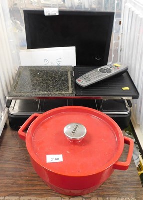 Lot 2180 - A Pyrex cast iron cooking pot with lid, an...