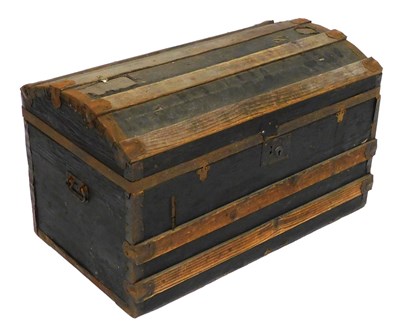 Lot 484 - An early 20thC black canvas and pine bound...