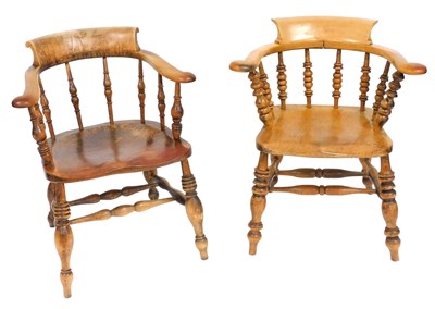 Lot 488 - Two Victorian smoker's bow chairs, one with...