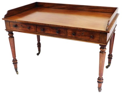 Lot 506 - A late Georgian mahogany writing table, with a...
