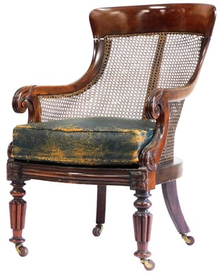 Lot 524 - A George IV mahogany bergere library chair,...
