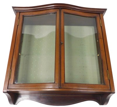 Lot 543 - An Edwardian serpentine mahogany hanging wall...