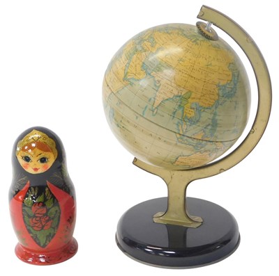 Lot 202 - A Soviet era tinplate globe, on a gimbal stand,...
