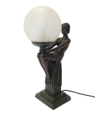 Lot 214 - A 20thC resin figural Art Deco style table...