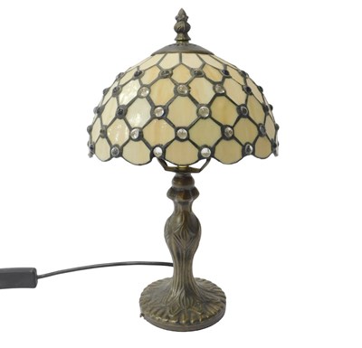 Lot 219 - A Tiffany style table lamp, the shade with...
