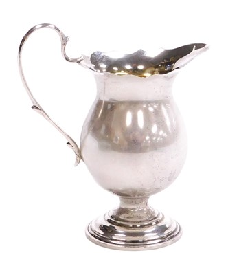 Lot 326 - An Elizabeth II silver cream jug, of baluster...