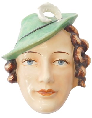 Lot 246 - A Goebel Art Deco wall mask, modelled as a...