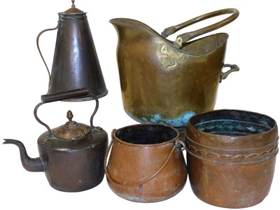 Lot 553 - A brass helmet shaped coal scuttle, 35cm high,...