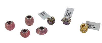 Lot 108 - Various bracelet charms, comprising four...