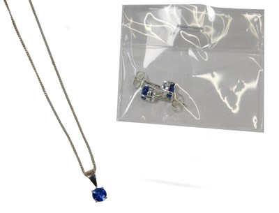 Lot 116 - A jewellery suite, comprising pendant set with...