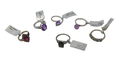 Lot 98 - Six dress rings, comprising smokey quartz and...