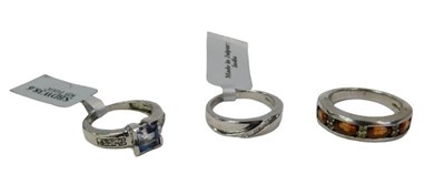 Lot 376 - Three dress rings, comprising a half hoop...