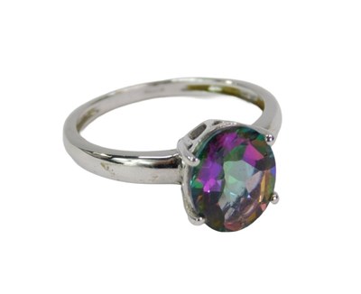 Lot 91 - A 9ct white gold dress ring, with a mystic...