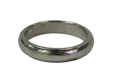 Lot 94 - A 9ct white gold wedding band, 5mm depth, set...