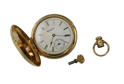 Lot 84 - A Hampden gold plated Hunter fob watch, the...