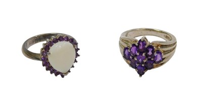 Lot 123 - Two white metal dress rings, each stone set,...