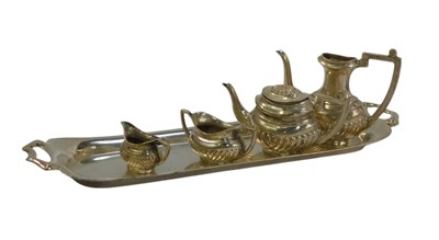 Lot 301 - A silver miniature four piece tea set,...