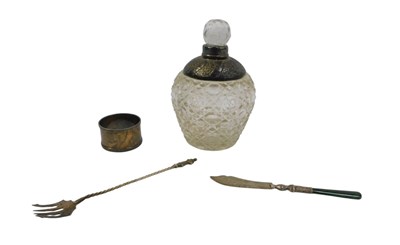 Lot 303 - A cut glass and silver coloured scent bottle,...
