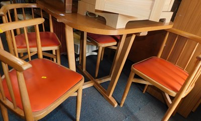 Lot 1002 - A mid-20thC dining table and four dining...