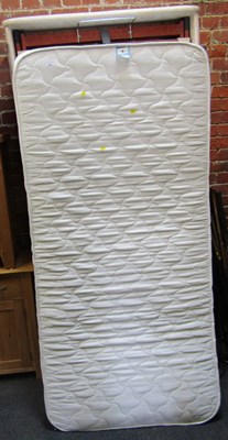 Lot 1037 - A single divan bed, with base unit.