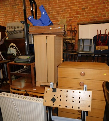 Lot 1028 - A six drawer wood effect chest of drawers, a...