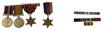 Lot 268 - A World War II medal bar, comprising Defence...