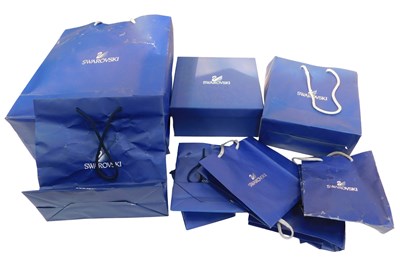 Lot 330 - A group of Swarovski shopping bags, boxes, etc....