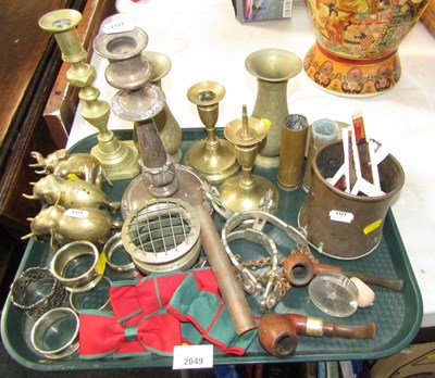 Lot 2049 - Copper and brass, in the form of candlesticks,...