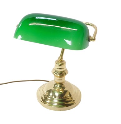 Lot 352 - A 20thC desk lamp, with a green glass shade...