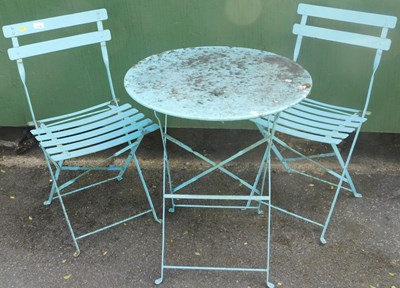 Lot 1118 - A cafe bistro set, folding table and two...