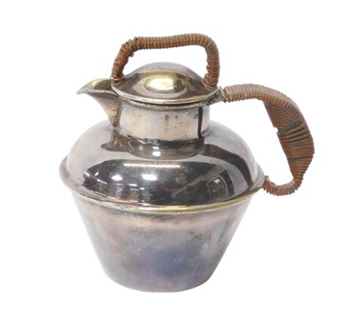 Lot 353 - A silver-plated Jersey cream jug, with a woven...