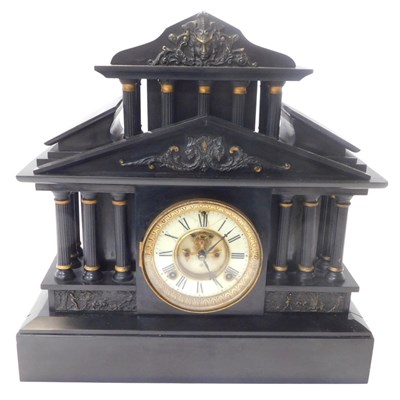 Lot 149 - A Victorian slate mantel clock, the circular...