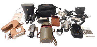 Lot 389 - A group of cameras and optical related...