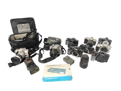 Lot 396 - A group of cameras and optical related...